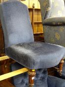 Victorian re-upholstered salon chair on walnut supports and brass castors