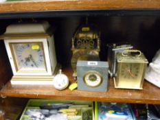 Reproduction brass lantern clock, bull's eye clock and four further modern mantel clocks