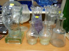 Moulded glass ornament in the form of a head, two vintage celery vases, a colourful swirl glass vase