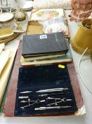 Commemorative book 'Silver Jubilee 1910-1935', a cased set of drawing instruments, three vintage