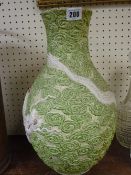 Interesting Satsuma vase decorated with a three toed dragon in relief flying amongst swirling