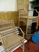 Circular smoked glass garden table with matching woven chairs