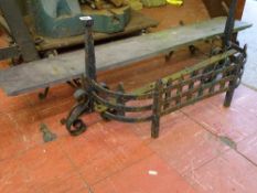 Piece of slate on wrought iron stands and a part wrought iron fire fender