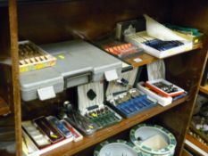 Good selection of mainly boxed and cased EPNS and other cutlery displayed over two shelves