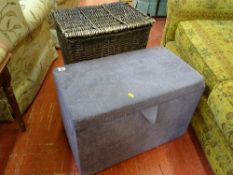 Modern upholstered blanket box and a lidded wicker linen basket
