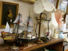 Four modern table lamps, two model boats displays etc