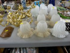 Six brass effect wall lights and a quantity of decorative glass lampshades