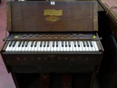 Vintage 'Marshall Brothers Universal Folding Organ', manufactured in the USA, in apparently