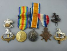 World War I group of three awarded to 40333 Pte D O Lloyd, RAMC, with four military cap badges