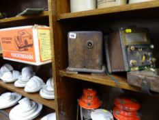 Boxed slide projector, an Eversheds ohm-meter etc