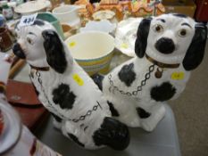 Pair of black and white Staffs comforter dogs