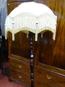 Reproduction mahogany standard lamp with a tasselled lampshade E/T