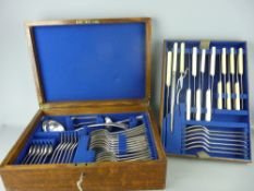 Oak cased canteen of EPNS cutlery with inset carry handles