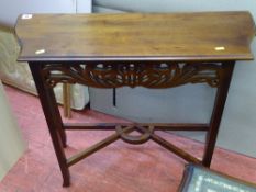 Slim reproduction mahogany hall table with fretwork detail