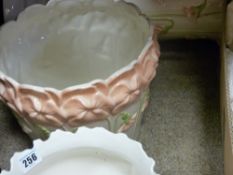 Floral decorated planter and stand and another porcelain