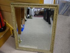 Gilt framed bevelled wall mirror