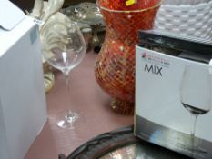 Two boxed sets of good modern long stemmed wine glasses and an art glass vase