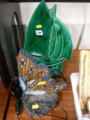 Majolica type pottery ornament in the form of a yacht and a modern leaded glass type butterfly lamp