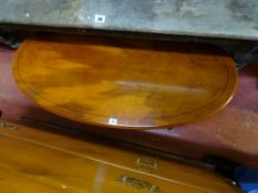 Yew wood oval topped pedestal coffee table