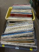 Two plastic crates of vintage LP records, various artists and compilations including Buddy Holly,