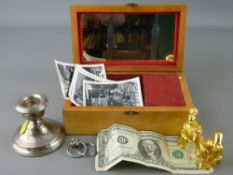 Inlaid lidded musical box, a hallmarked silver squat candlestick, two Risis gilt decorated