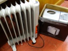 Cookworks Signature breadmaker and an oil filled electric heater E/T