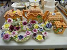 Four pieces of cottage tableware and a collection of ceramic floral posies