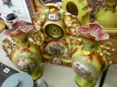 Victorian pottery clock garniture