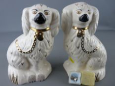 Pair of Royal Doulton spaniel comforter dogs and a pair of leaf shape white metal clip on earrings
