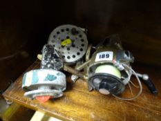 Four vintage fishing reels etc