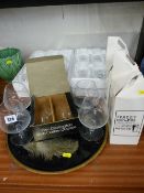 Boxed quantity of drinking glassware, four brandy glasses with blue teardrops and a vintage circular
