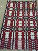 Vintage Welsh woollen blanket, traditional pattern on purple and black tones