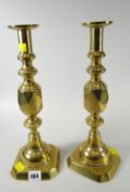 A pair of Ace of Diamonds brass candlestick holders Condition reports provided on request by email