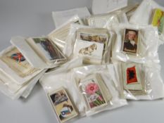 A large collection of cigarette cards sorted into subject matter Condition reports provided on