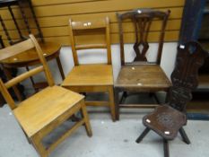 Pair of circa 1890 oak bar back farmhouse chairs having label to base Philip Wheeler, High Street