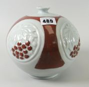 A Continental moulded pottery bottle vase Condition reports provided on request by email for this