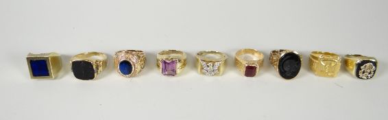 Nine various yellow metal set rings with either continental hallmarks, unclear hallmarks or unmarked