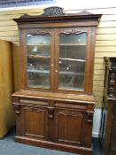 Victorian mahogany two-stage bookcase cupboard having glazed top above two blind panel cupboards, on
