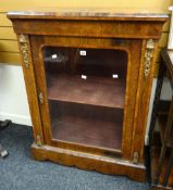 Victorian pier cabinet with gilt metal raised on platform-type base and having fitted shelf to the