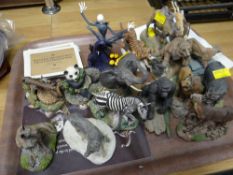 Collection of resin collector's animals together with display stand Condition reports provided on
