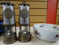 Two reproduction miner's lamp and a floral decorated bowl Condition reports provided on request by