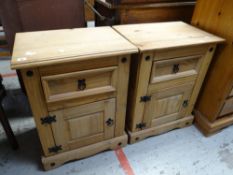 Pair of modern pine bedside cupboards with single drawer above blind panel cupboard (2) Condition