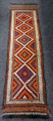 An Old Suzni Kelim runner carpet, 240 x 59cms Condition reports provided on request by email for