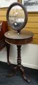 Twentieth century mirror top shaving stand raised on tripod base having adjustable back above