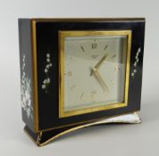 A vintage Elliott Clock ebonized and floral painted table clock Condition reports provided on
