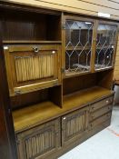 Mid-twentieth century oak linen-fold design wall unit display cabinet Condition reports provided