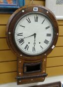 Vintage mahogany veneered wall clock with large circular Roman numeral face and mother of pearl