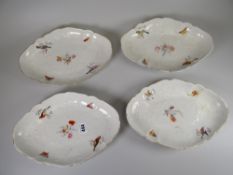 Set of four nineteenth century continental porcelain hand painted oval serving plates Condition