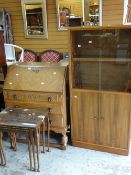 Mid-century fall-front bureau, nest of three glass topped tables and bookcase cabinet (3)