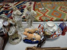 A parcel of mixed china including continental figurine, Royal Doulton figurine 'Marie', Imari plate,
